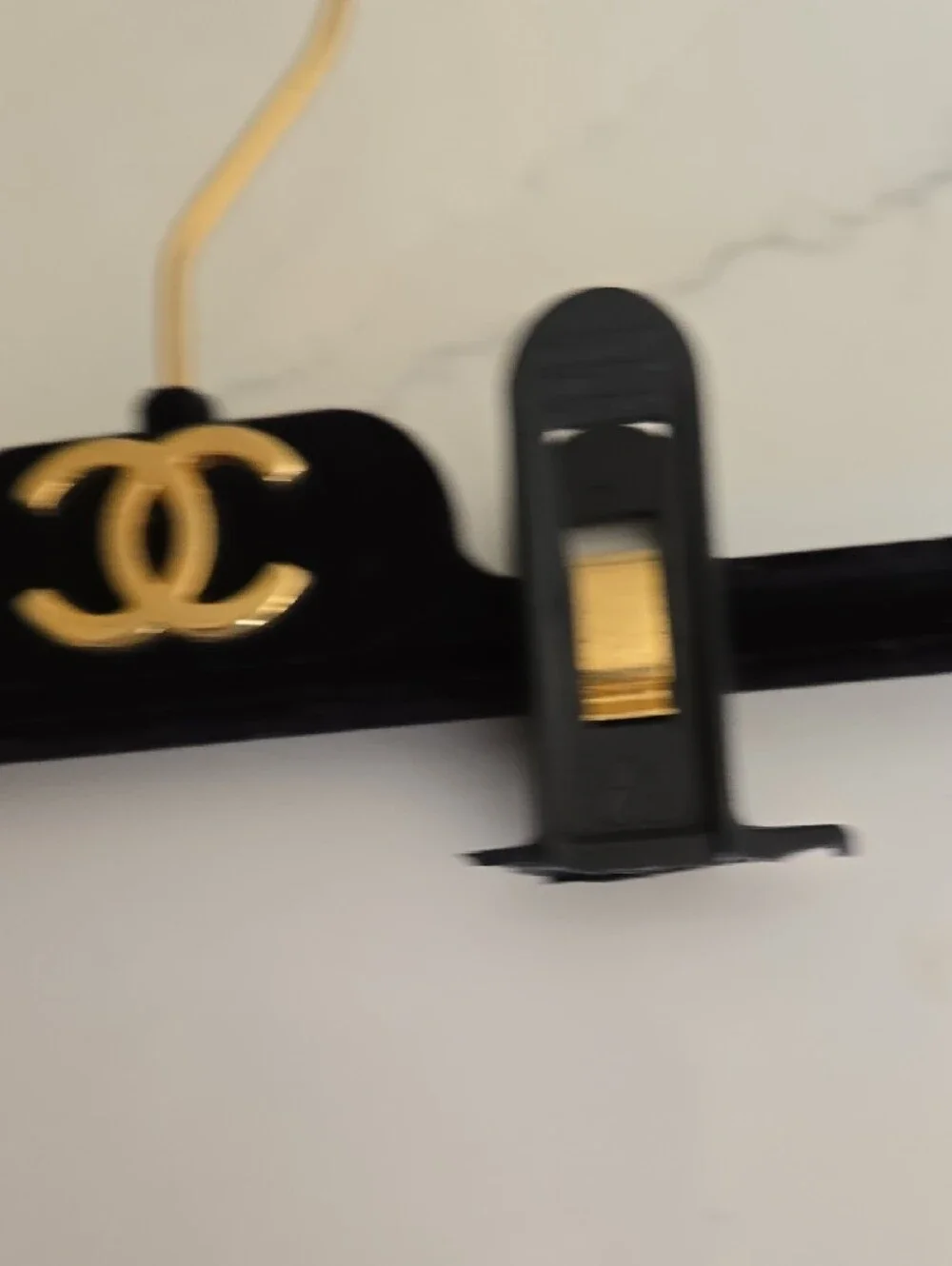 CHANEL Black and Gold Velvet Clip Hanger with CC Emblem